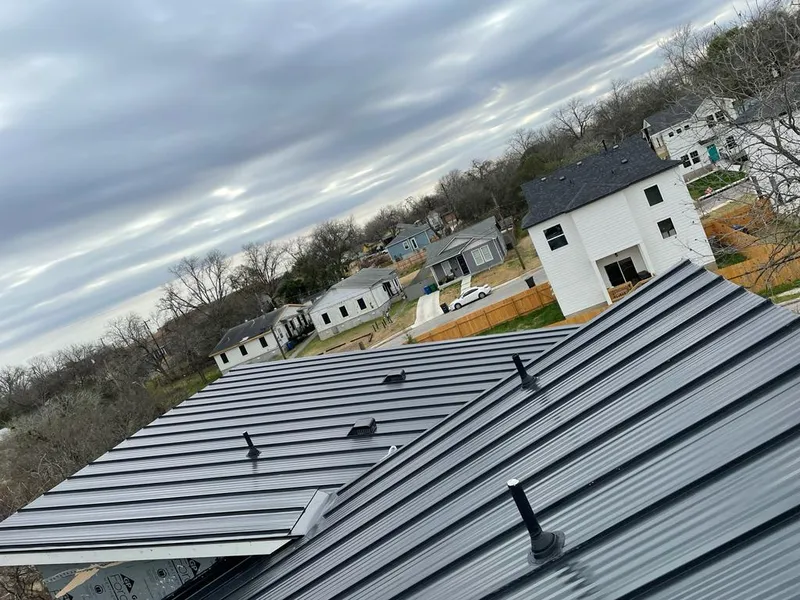 Standing seam metal roof panels with vents for Skylight Repair in De Queen